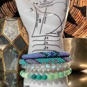 Glass and Stone Bracelet stack purples, blues and greens iridescent